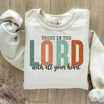 a white shirt that says trust in the lord with all your heart