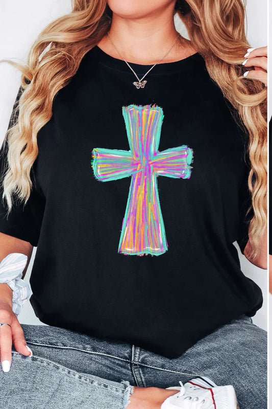 a woman wearing a black t - shirt with a colorful cross on it