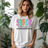 a woman wearing a white t - shirt with the words senior on it
