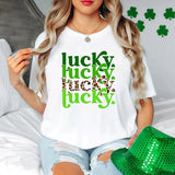 a woman sitting on a bed wearing a t - shirt that says lucky lucky lucky
