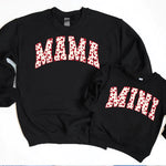 a couple of sweatshirts that are on a table