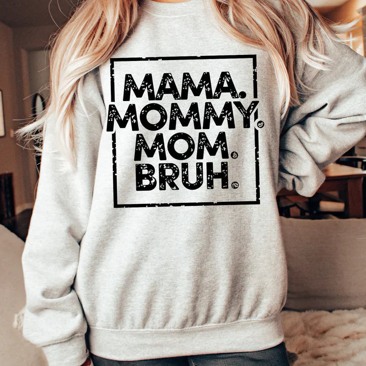 a woman wearing a sweatshirt that says mama, mommy, mom, bruh