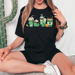 a woman sitting on the floor wearing a black shirt