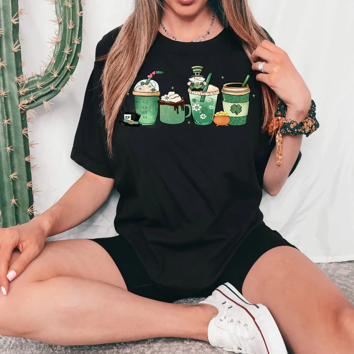 a woman sitting on the floor wearing a black shirt