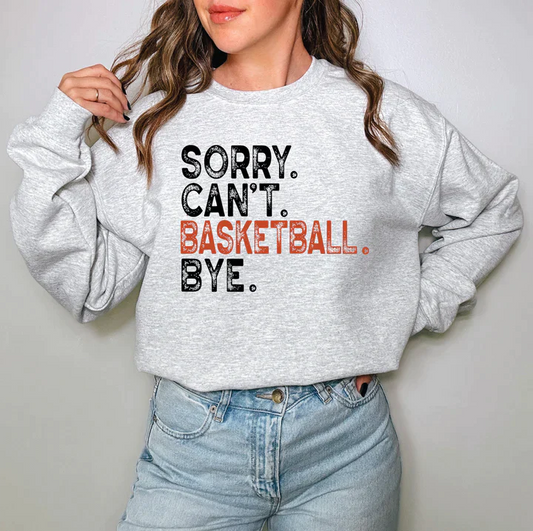 a woman wearing a sweatshirt that says sorry can't basketball bye