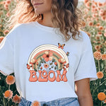 a woman standing in a field of flowers