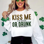 a woman wearing a st patrick's day sweatshirt