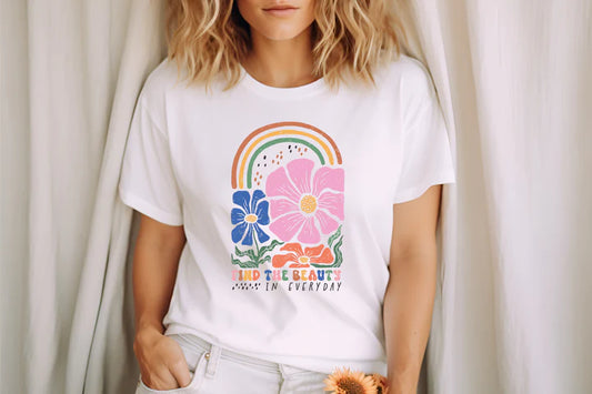 a woman in a white shirt holding a teddy bear