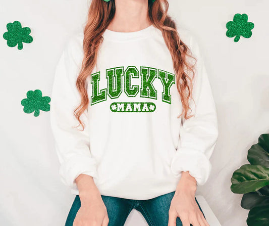 a woman wearing a lucky mama sweatshirt