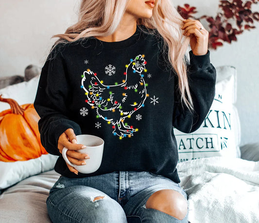 a woman sitting on a bed holding a cup of coffee