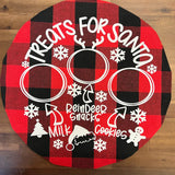 a red and black plate with a picture of a couple of rings on it