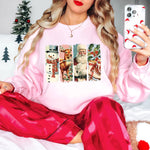 a woman sitting on a bed holding a cell phone