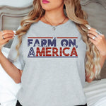 a woman standing in front of a bed wearing a t - shirt that says farm