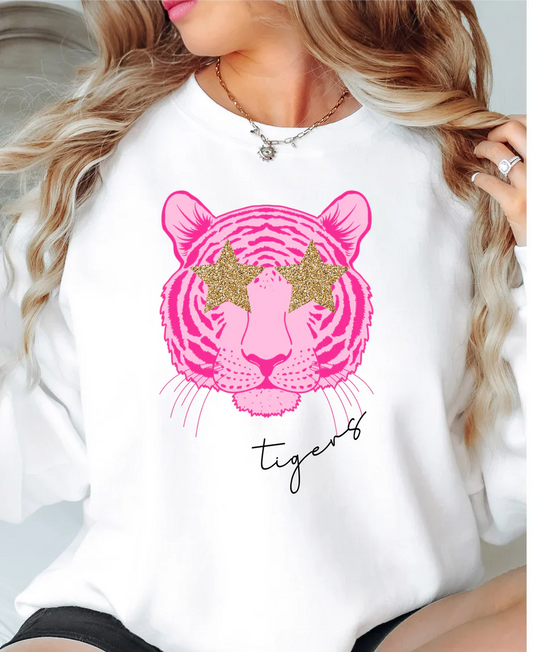a woman with blonde hair wearing a white tiger t - shirt
