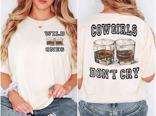 a woman wearing a cowgirl shirt with two glasses of whiskey on it