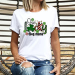 a woman wearing a white shirt and ripped jeans