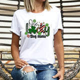 a woman wearing a white shirt and ripped jeans