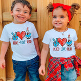 two young children standing next to each other