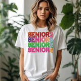 a woman wearing a white shirt that says senior seniors