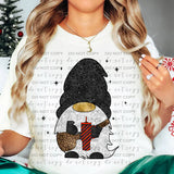 a woman sitting on a couch wearing a penguin t - shirt